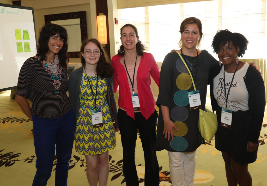 Rivkah Beth Medow with a group of female scientists at the 2019 Innovations Symposium.