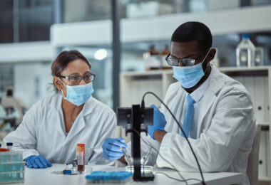 Two scientists working together in a research lab