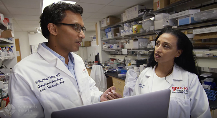 Two scientists working in the lab.