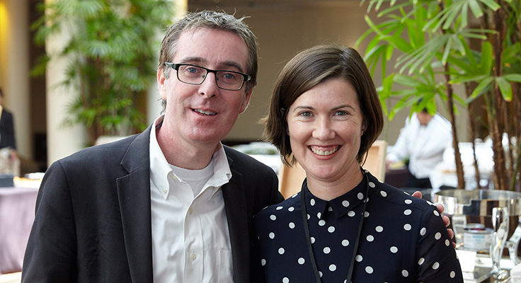 Doctors David Artis and Kate Jeffrey standing together, smiling at the camera.