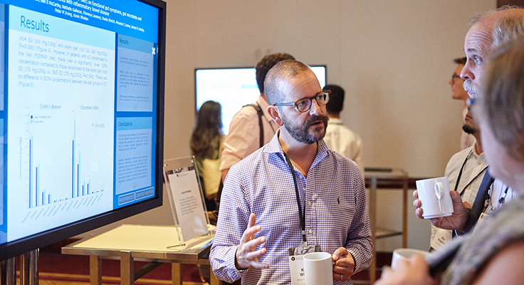 Dr. Kevin Whelan presenting during a digital poster session.