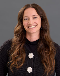 Headshot of Megan De Trane